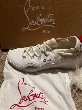 Christian Louboutin 
CL Paris White Low Top Sneakers EU 43.5 / US 10.5 Men’s